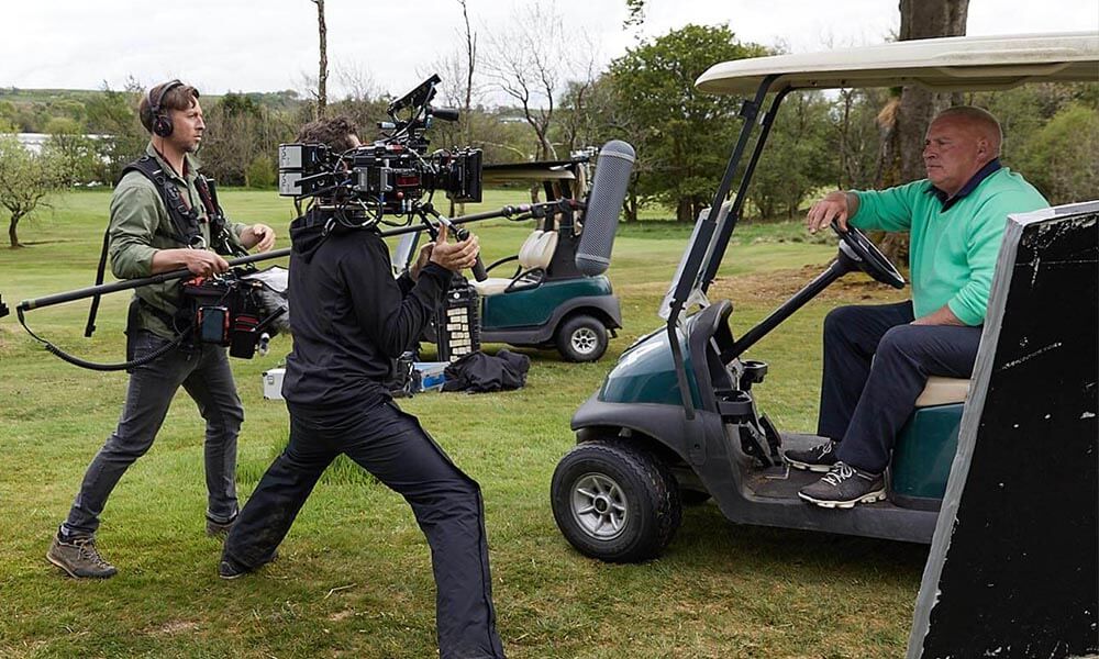 index-marketplace Film crew on a golf course